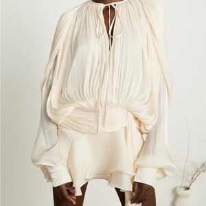 EUGÉNIE FULLY-PLEATED RUFFLED MINI DRESS IN NEUTRALS